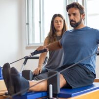 Client on Pilates Reformer 